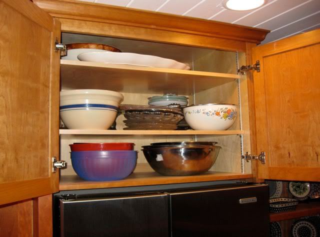 Cabinet over Refrigerator--What goes in there? - Kitchens Forum 